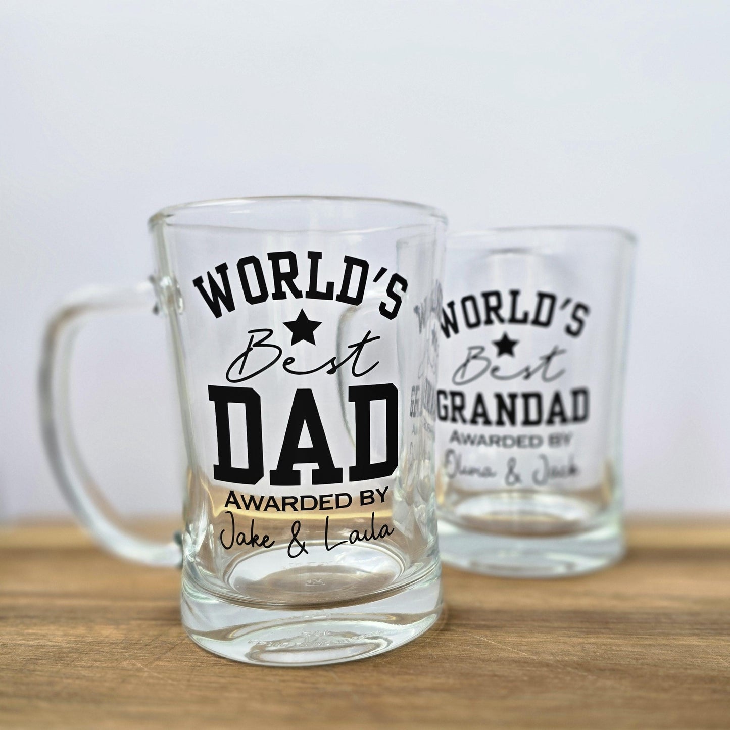 Personalised 'World's Best' beer stein glass customised with Dad, Grandad, Husband or Boyfriend, and 'Awarded by' and the gift givers name.
