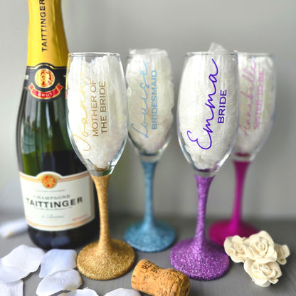 Prosecco glass or Champagne flute decorated with high shine glitter stem and personalised with a name in decorative font and wedding roll – Bride, Groom, Mother of the Bride, Bridesmaid, Sister of the bride, Maid of Honour.