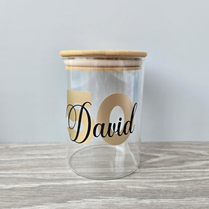 Personalised glass jar with wooden suction lid with a large age and name in gold and black vinyl
