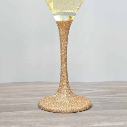 Prosecco glass or Champagne flute decorated with high shine glitter stem and personalised with 21 + the number of months to make up a 30th, 40th, 50th, 60th or 70th Birthday.