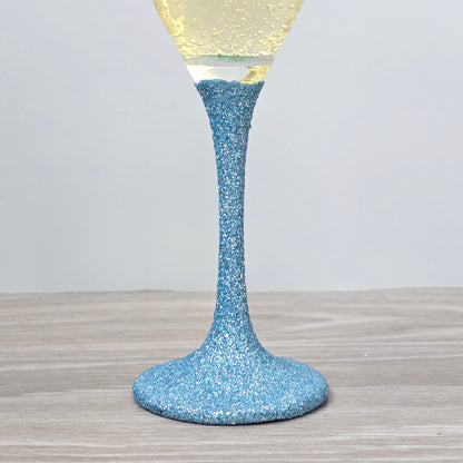 Prosecco glass or Champagne flute decorated with high shine glitter stem and personalised with 21 + the number of months to make up a 30th, 40th, 50th, 60th or 70th Birthday.