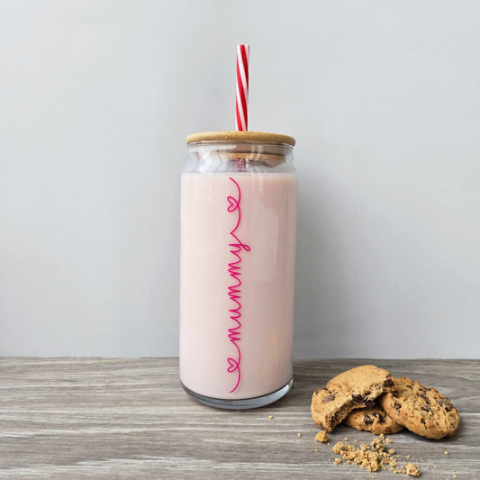 Personalised glass can drink tumbler with a bamboo suction lid and red and white reusable straw. Name printed in decorative font, in a range of colours, printed along the glass.