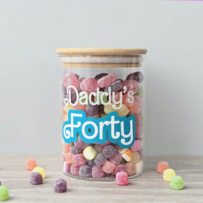 Jar of colorful gummy candies with 'Daddy's Forty' text on a light background