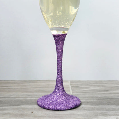 Prosecco glass or Champagne flute decorated with high shine glitter stem and personalised with 21 + the number of months to make up a 30th, 40th, 50th, 60th or 70th Birthday.
