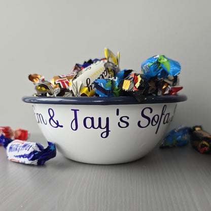 White steel enamel metal snack bowls with sofa snacks printed in purple decorative font.